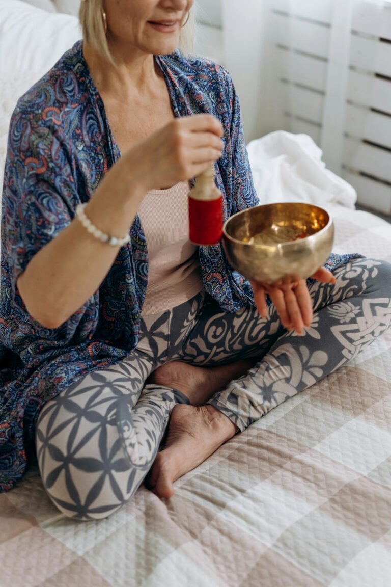 Woman Holding a Singing Bowl 